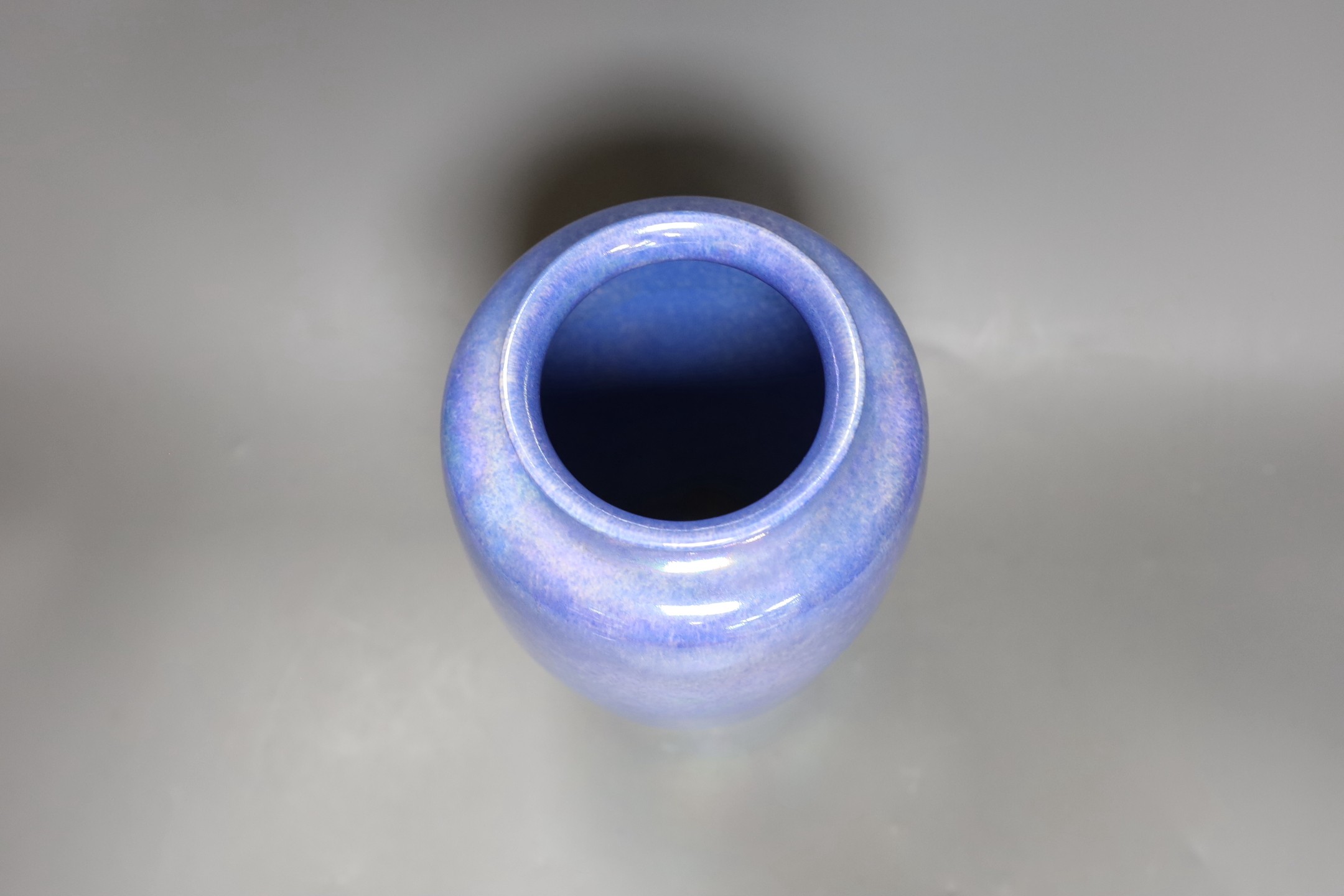 A large Ruskin blue and green lustre vase, dated 1926. 26cm.